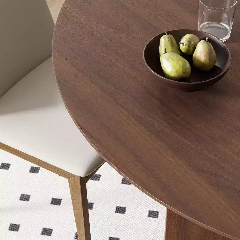 Table de salle à manger ronde 59 x 59 en bois massif avec finition noyer et pieds élégants arqués pour salles à manger et cuisines modernes