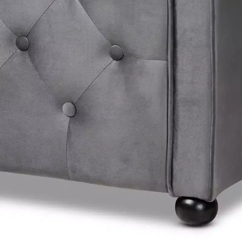 Lit de repos en tissu velours avec capitonnage à boutons