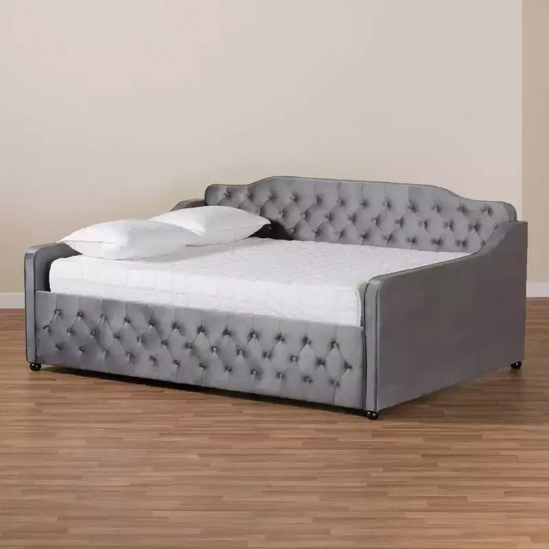 Lit de repos en tissu velours avec capitonnage à boutons